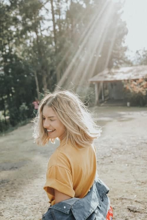 five-points-mental-health Woman smiling in the sunshine after acupuncture